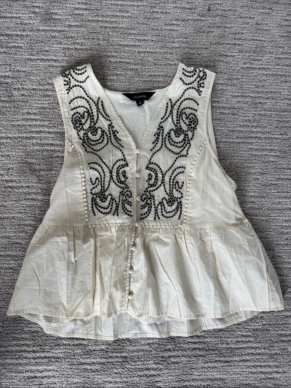 Callisto Cream Sleeveless Embroidered Peplum Top